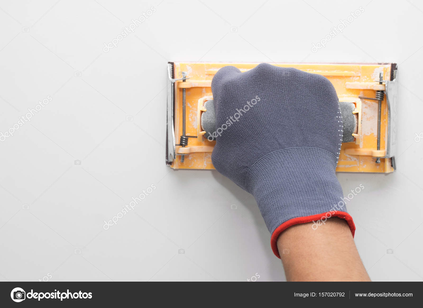 Hand with sandpaper Stock Photo by ©amickman 157020792