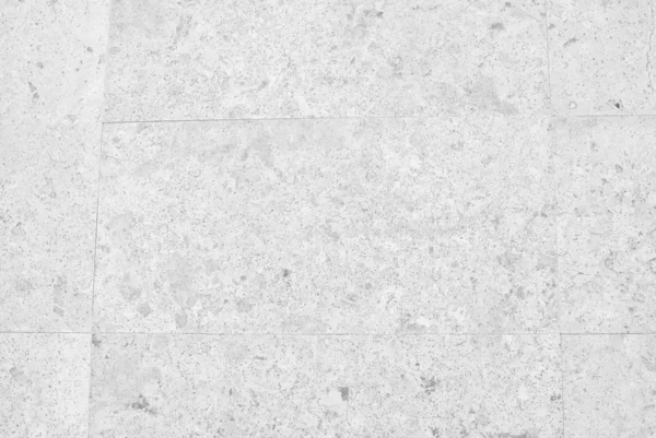 灰色の石造りの壁と白をクローズ アップ。背景用 — ストック写真