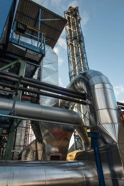 Four complex metal chimneys — Stock Photo, Image