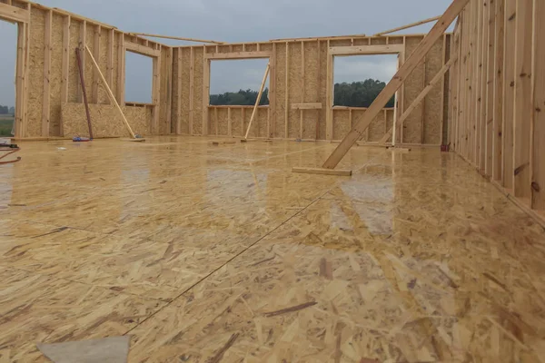 Rain while building a home in skeleton technology — Stock Photo, Image