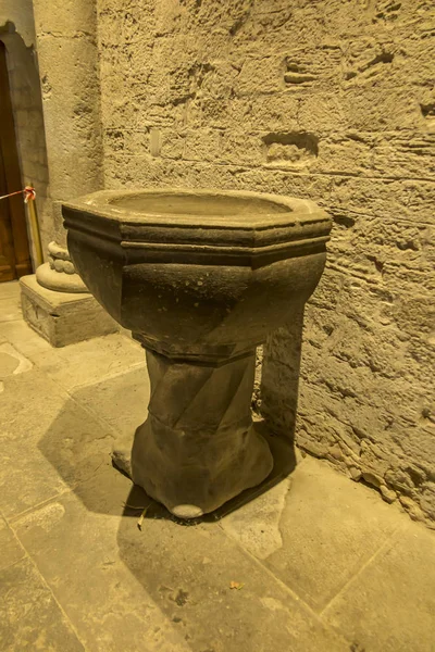 Carcassonne, France, 25 June 2019: Decorative baptismal font in — 스톡 사진