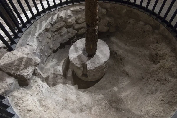 Bethany, Betania, Israel January 31, 2020: Commemorative interior of the house of Mari, Martha and Lazarus, Jesus\' friends in Bethany and in it an olive oil press, stone for grinding grain and others.