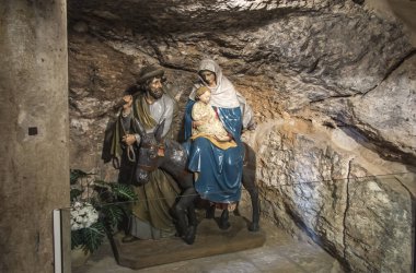 Bethlehem, Palestinian Authority, January 28, 2020: Fragment of the interior in the Milk Grotto Church in Bethlehem in Palestine. Mary with Jesus on a donkey and Saint Joseph clipart