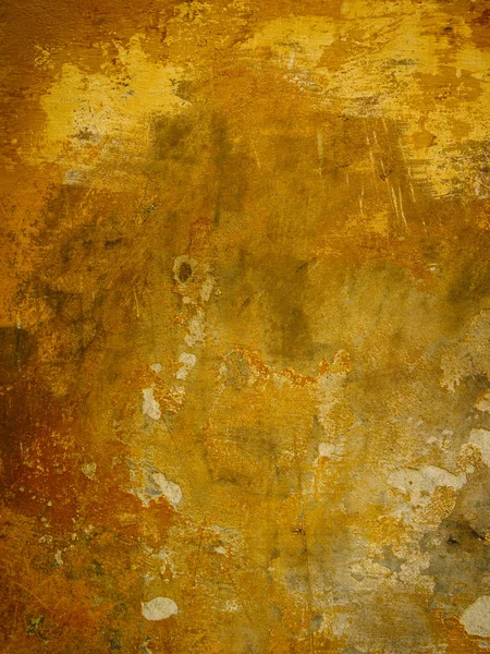 Textured and distressed yellow wall — Stock Photo, Image