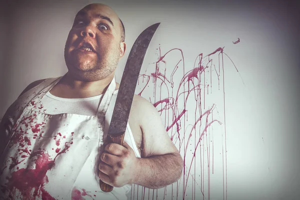 Mad butcher with large knife — Stock Photo, Image