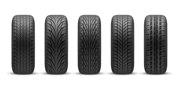 Realistic car tires with different tread patterns — Stok Vektör