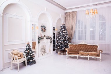 Winter New Year and Christmas decoration in classical hall. clipart