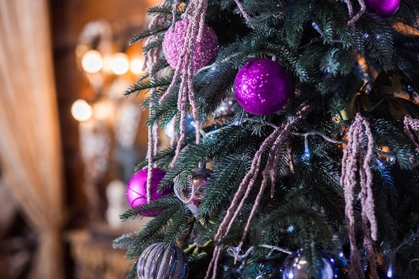 Christmas tree with holiday ornaments and copy space left. — Stock Photo, Image