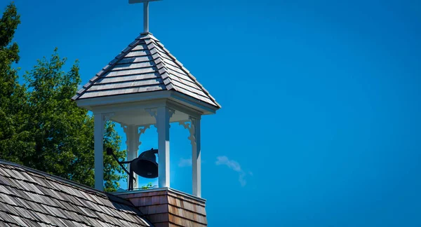 Church bell and wooden tower — Stock Photo, Image