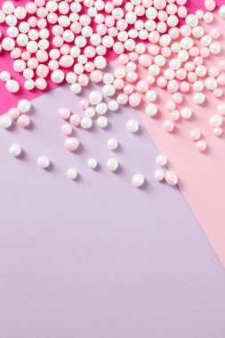 Şeker şeker üzerine pastel renkli arka plan dağınık