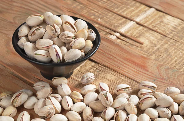 Pistachos en tazón — Foto de Stock