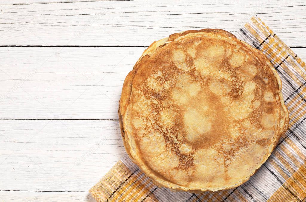 Fried pancakes on table