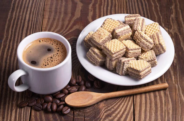 Coffee and chocolate wafers — Stock Photo, Image