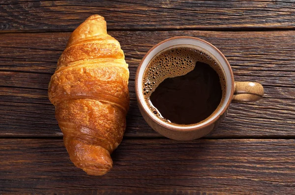 Croissant a káva — Stock fotografie