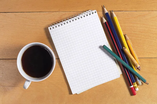 Cuaderno y café — Foto de Stock
