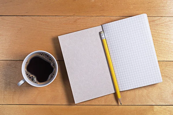 Cuaderno con café — Foto de Stock