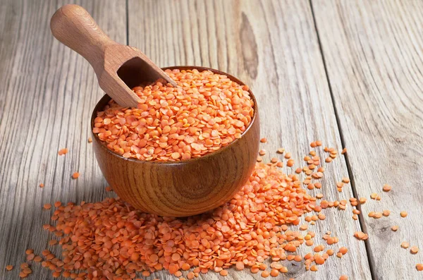 Red lentils in bowl — Stock Photo, Image