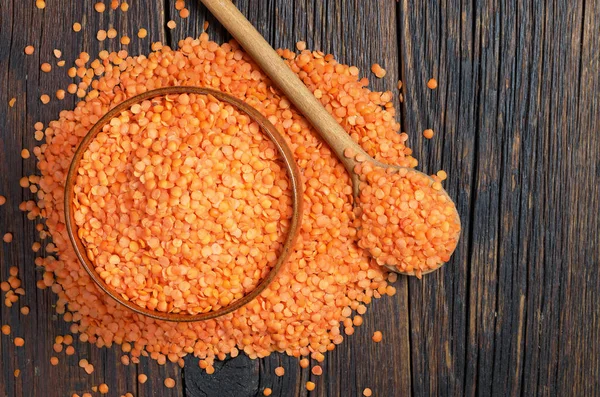 Red lentils in bowl — Stock Photo, Image