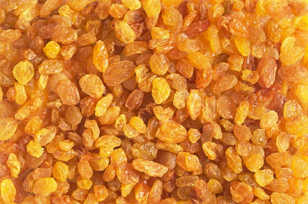 Golden rozijnen textuur — Stockfoto