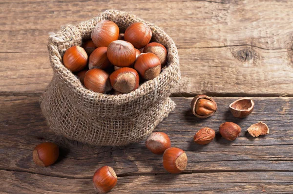 Hazelnuts in sack — Stock Photo, Image