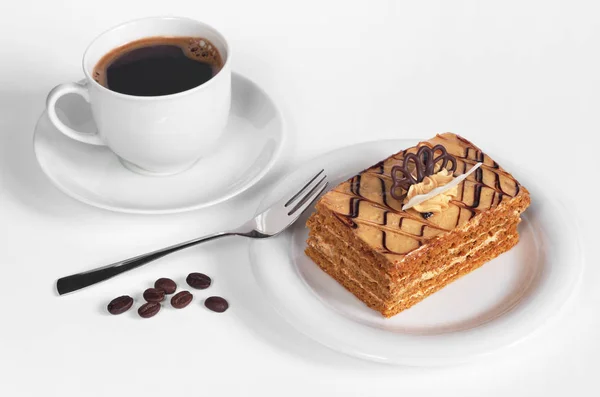 Honey cake and coffee — Stock Photo, Image