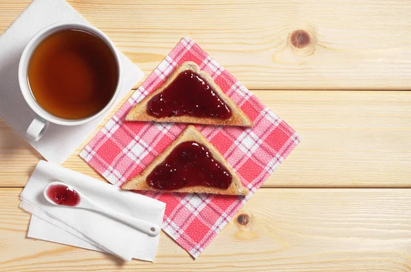 Tea and toasted bread with jam — Stock Photo, Image