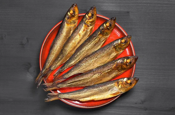 Smoked herring in plate — Stock Photo, Image