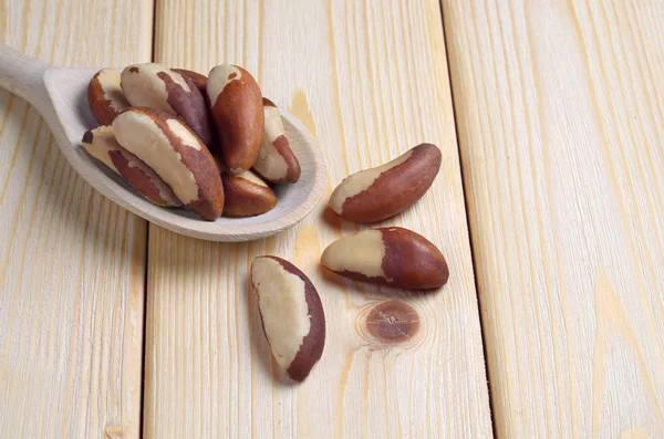 Brazil nuts in spoon — Stock Photo, Image