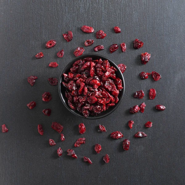 Bowl with dried cranberries — Stock Photo, Image