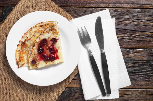 Pancake with jam and cutlery — 스톡 사진