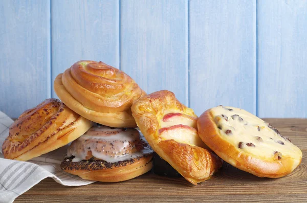 Various Freshly Baked Buns Wooden Table Close — Stock Photo, Image