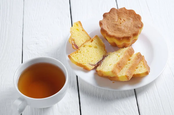 Cup Tea Vanilla Muffins Sliced Whole White Wooden Table — Stock Photo, Image