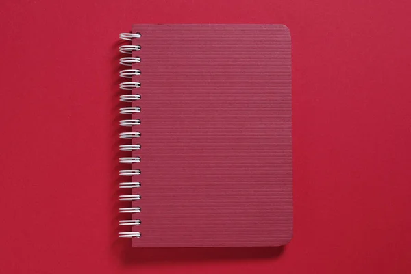 Dark Red Notebook Spiral Close Top View — Stock Photo, Image