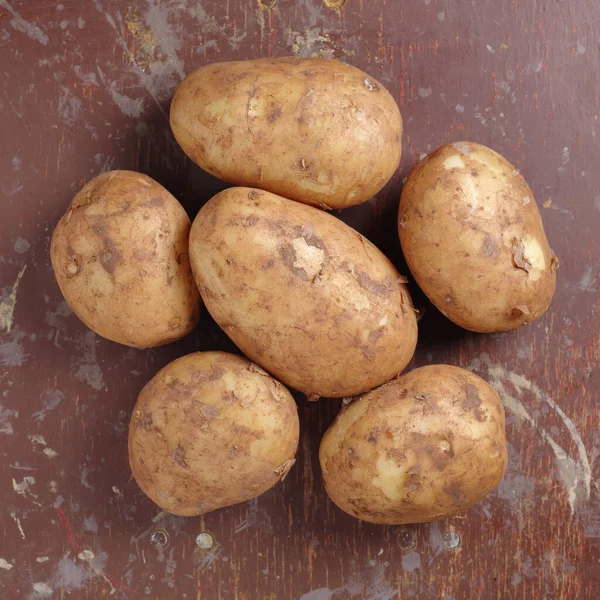 Groep Aardappelen Vuile Achtergrond Close Bovenaanzicht — Stockfoto