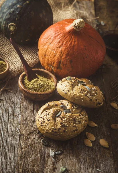 Pumpkin buns on wood — Stock Photo, Image