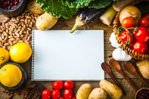 Vegetables with notebook — Stock Photo, Image