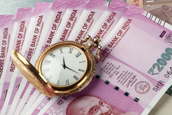 New Indian Rupees Currency with antique time watch — Stock Photo, Image