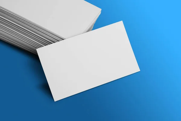 Leere Visitenkarten-Attrappe auf blauem Hintergrund — Stockfoto