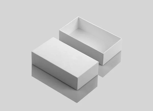 Üres fehér nyílt termék doboz szürke háttér — Stock Fotó