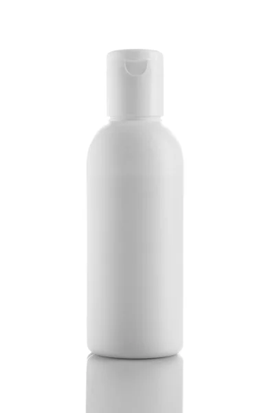 Пластиковые белые бутылки для макетов — стоковое фото