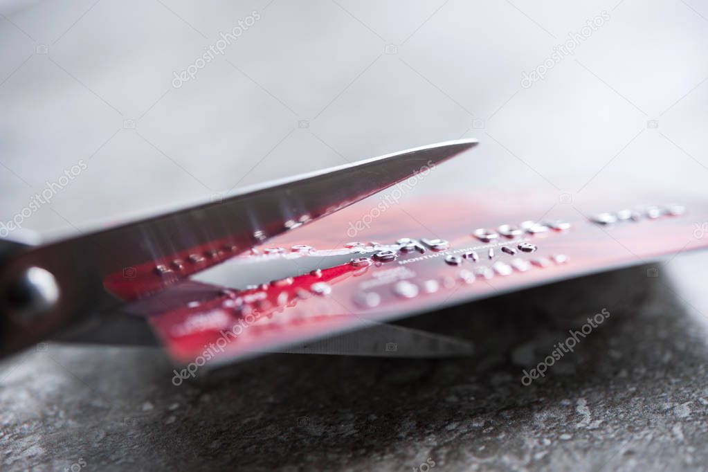 Credit card being cut 