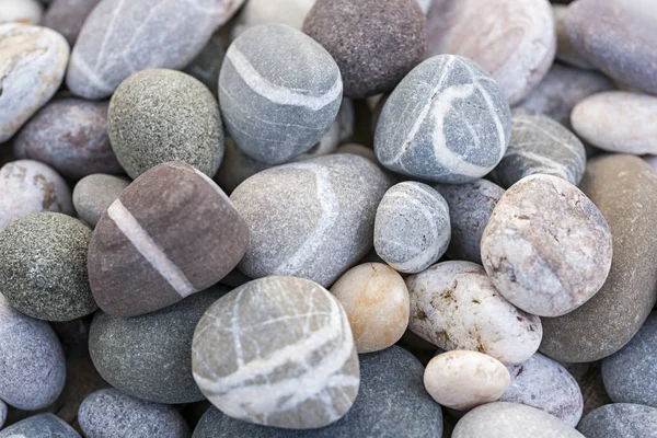 Strandje afgeronde kiezels — Stockfoto