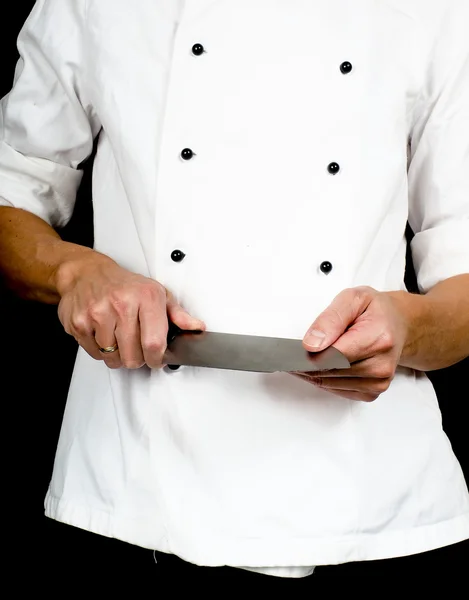 Chef professionista con un coltello da cucina affilato — Foto Stock