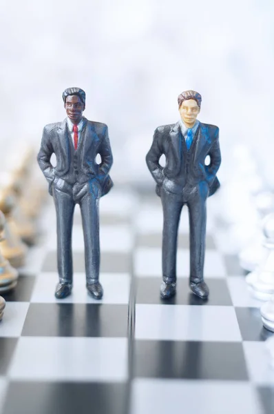 Businessmen on chessboard — Stock Photo, Image