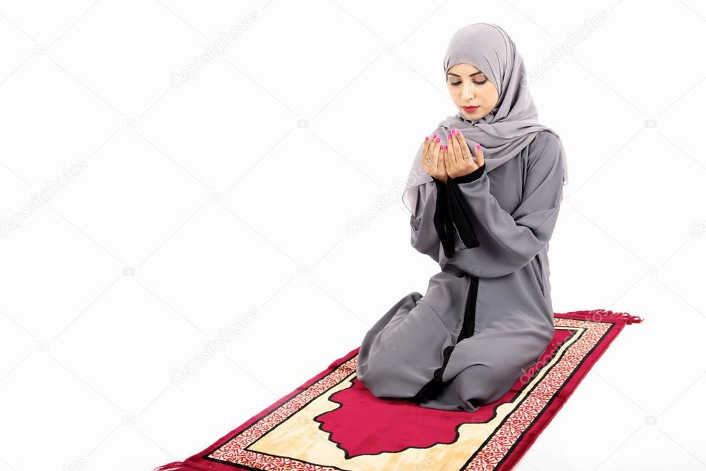 Arab muslim woman praying