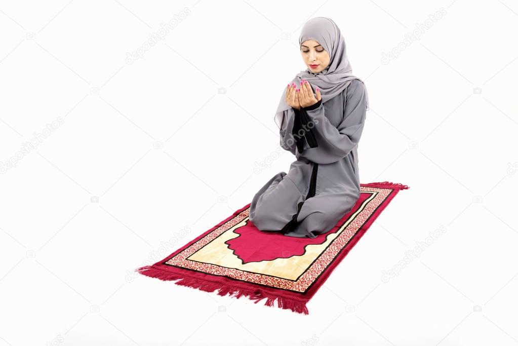 Arab muslim woman praying