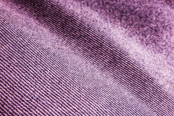 Джинсы фиолетового цвета — стоковое фото