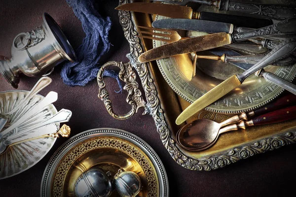 Old silver dishes with accessories for the kitchen