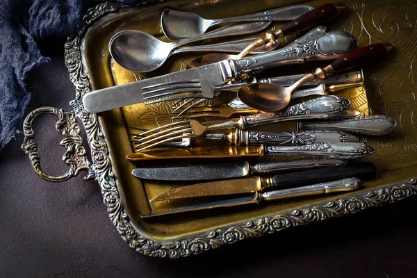 Old silver dishes with accessories for the kitchen