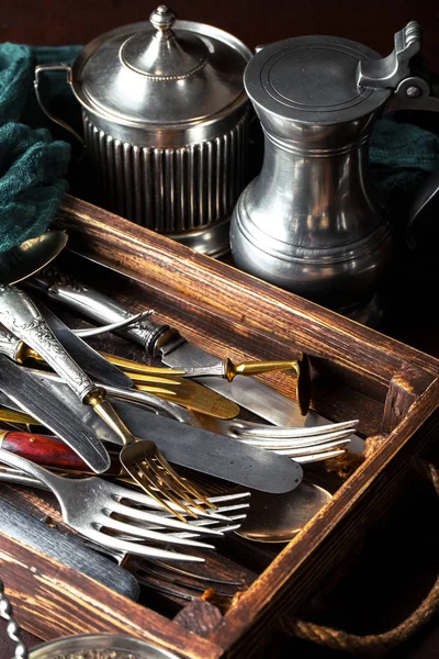 Old silver dishes with accessories for the kitchen